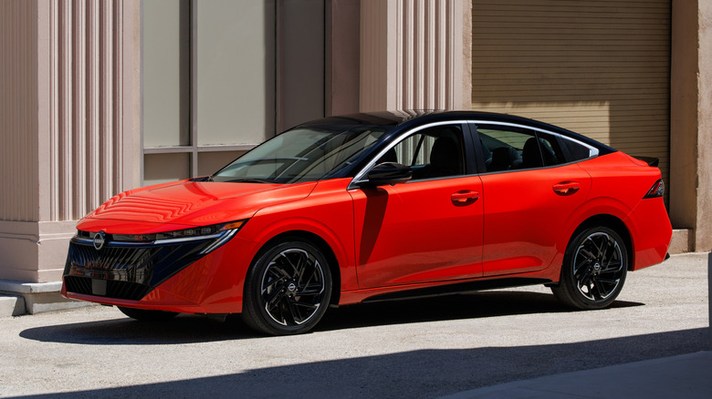 Front 3/4 view of Nissan Sentra in urban setting