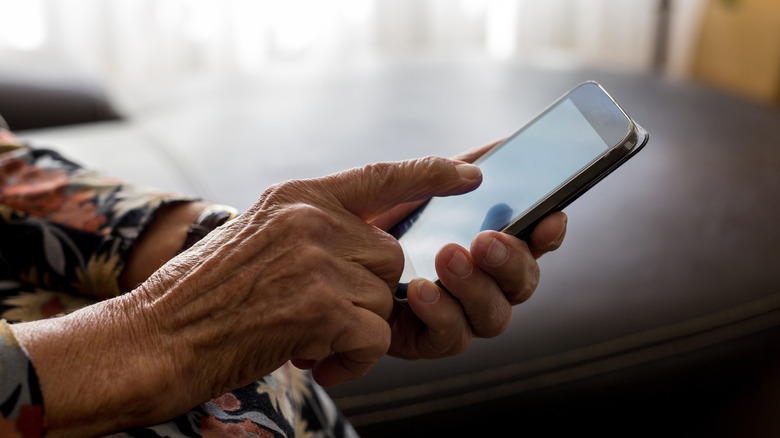 A senior person on a call