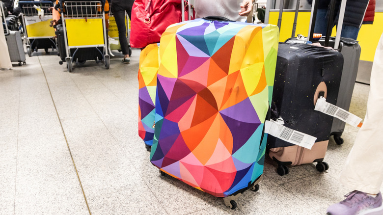Bag with colorful luggage cover