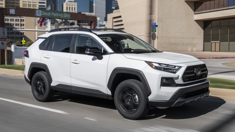 Toyota RAV4 TRD driving in city, front-right 3/4 view