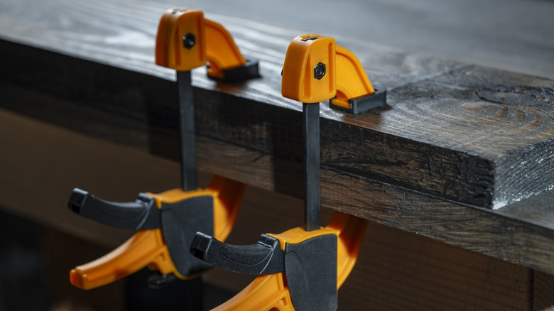 clamps attached to a board