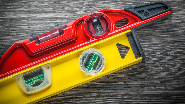 red and yellow level laying against each other