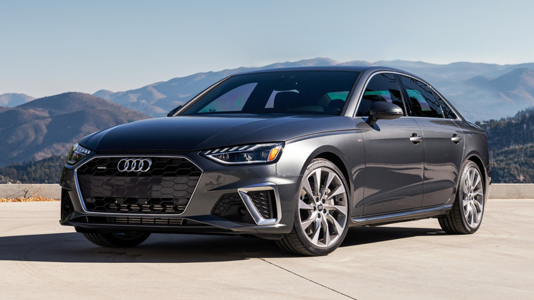 Audi A4 with mountains in the background