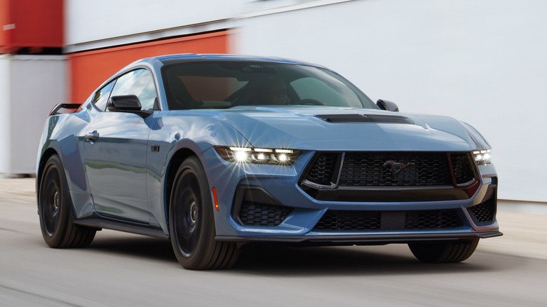 Ford Mustang driving at speed