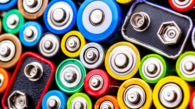 Close-up of alkaline batteries in multiple colors