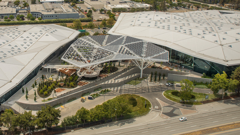 overhead view of NVIDIA headquarters with a futuristic building and green space.