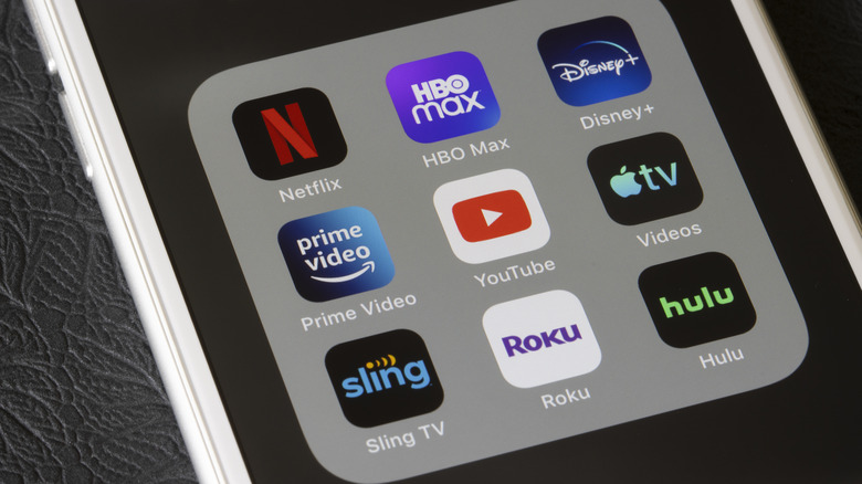 An iPhone screen showing the Netflix, HBO Max, Disney +