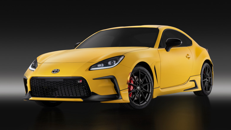 2026 Toyota GR86 on black background, front-left 3/4 view