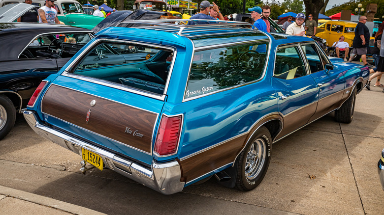Rear view of a blue Oldsmobile Vista Cruiser wagon