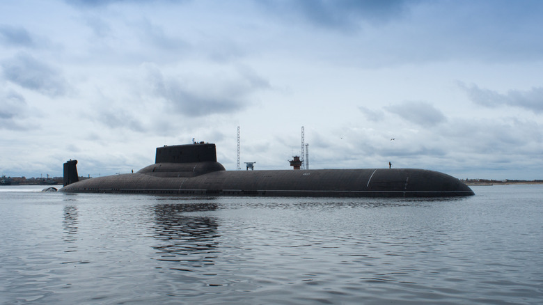 A nuclear submarine leaving a port