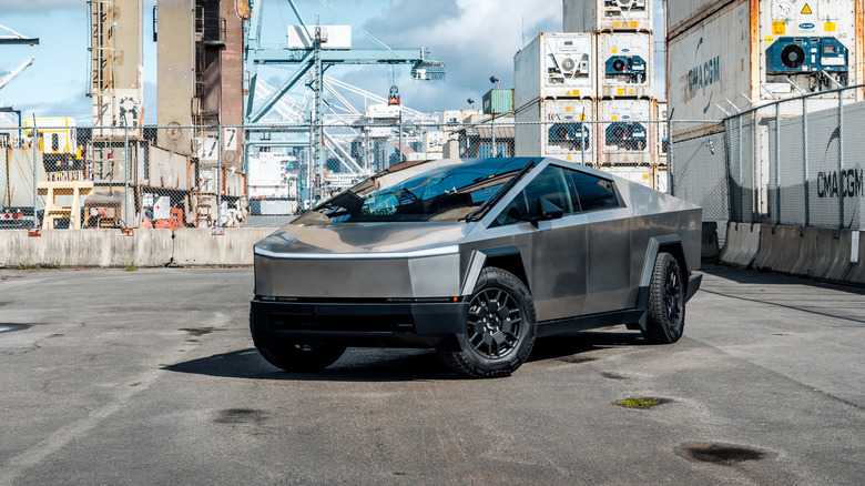 A Tesla Cybertruck parked at a dock