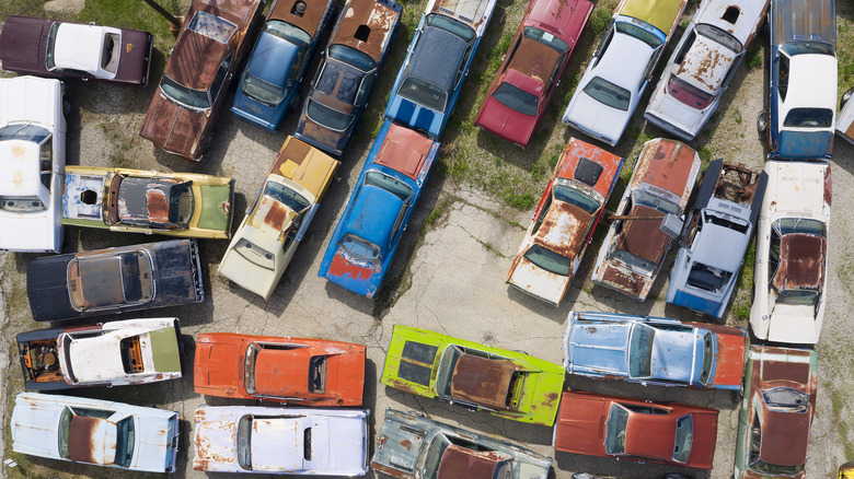 Group of old cars parked in a lot