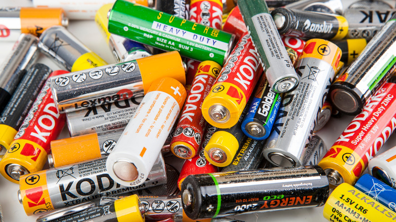 Collection of AA and AAA batteries in a pile
