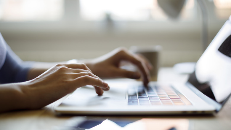 a person using a laptop