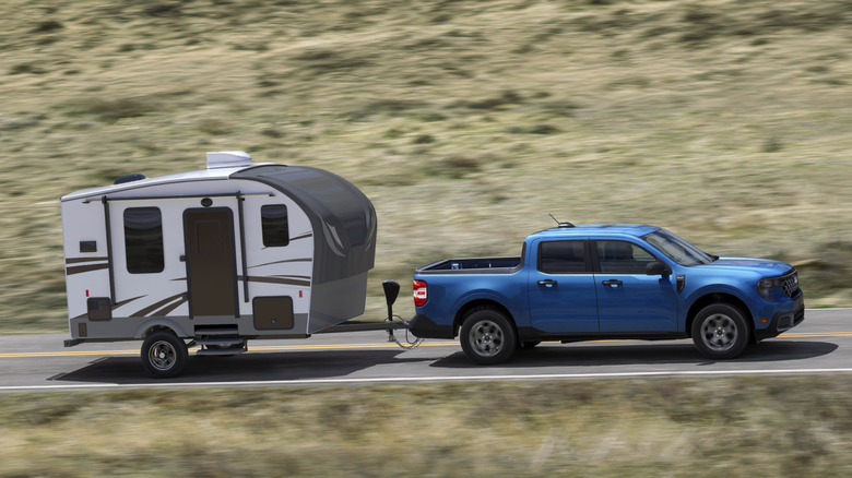 Side shot of a Ford Maverick towing