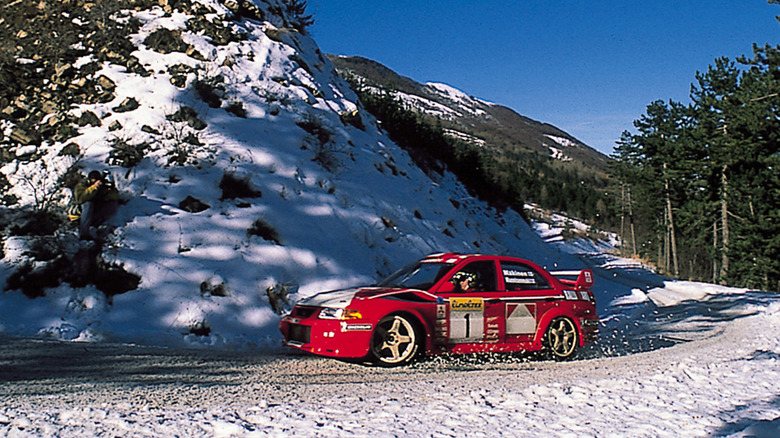 1999 Mitsubishi WRC Evo rallying in snow