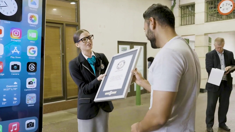 Arun Maini breaking world record for biggest iPhone