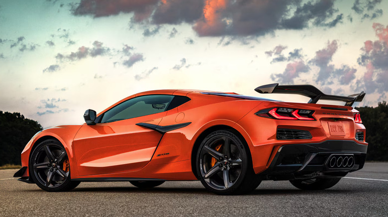 Rear quarter view of an orange 2025 Corvette Z06