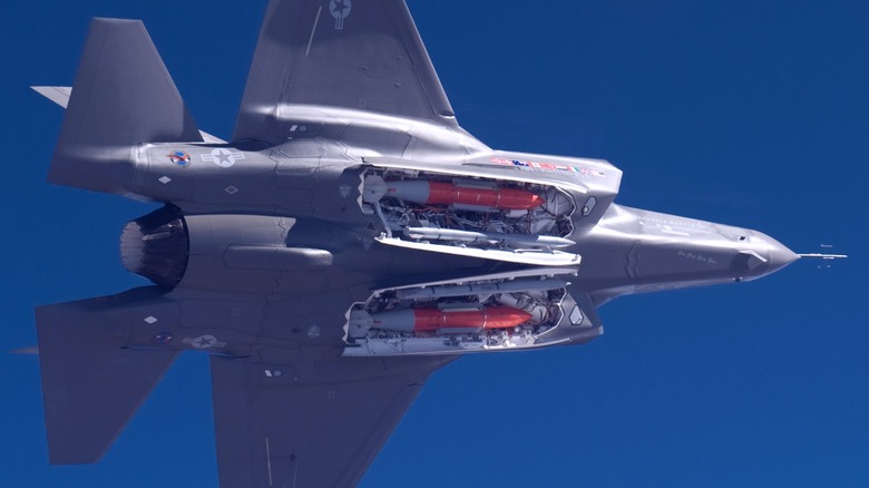 An F-35A weapon bays with two B61 nuclear bombs and 2 AIM-120 AMRAAM