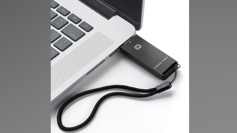 Oyen Digital 4TB Dash Pro plugged into the laptop