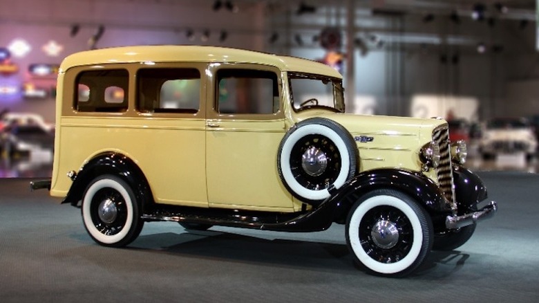 Front 3/4 view of 1936 Chevrolet Suburban in GM Heritage Center