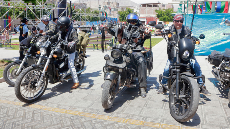 Group of Latin American bikers gathered in a motorcycle club event