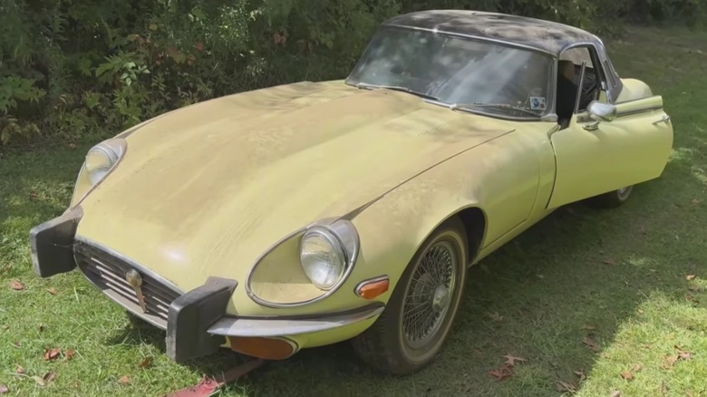 A Jaguar E-Type outdoors.
