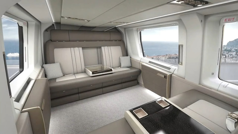 The luxury, light, and open interior of the ACH160 helicopter.