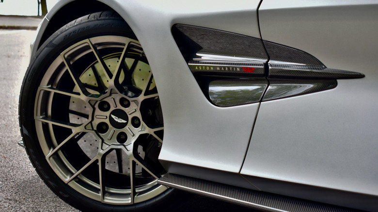 2026 Aston Martin Vanquish Volante front fender vent and wheel.