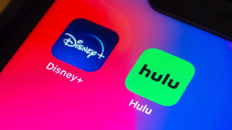 Disney+ and Hulu icons on an iPhone screen