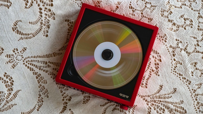 Disk spinning in the FiiO DM15 R2R on top of a lace table cloth.