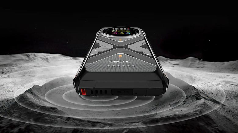 A close-up of the bottom of the Oscal Tank 1 on a gray surface