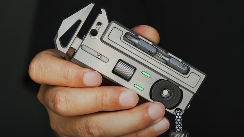 Hand holding the OmniPro 2.0 Wrench Titanium Multi-Tool