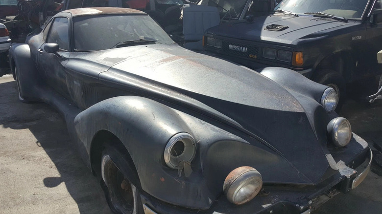 Black Kanzler Coupe in a junkyard
