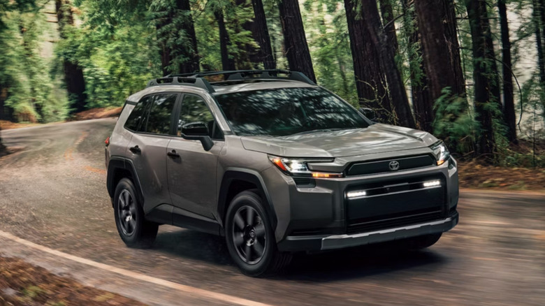 Toyota Rav4 driving through the woods
