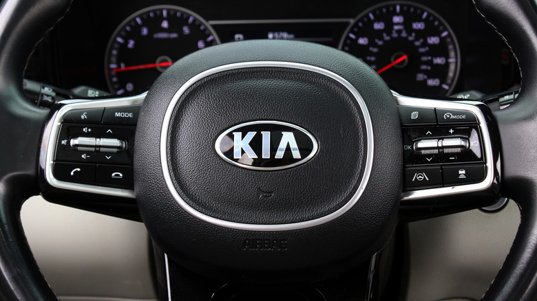 A Kia vehicle's steering wheel.