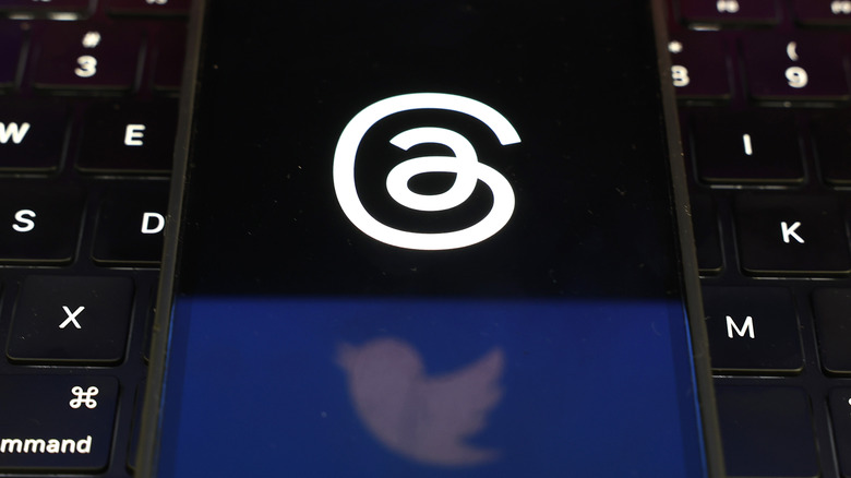 threads logo twitter reflection