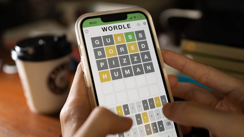 person playing Wordle on a smartphone