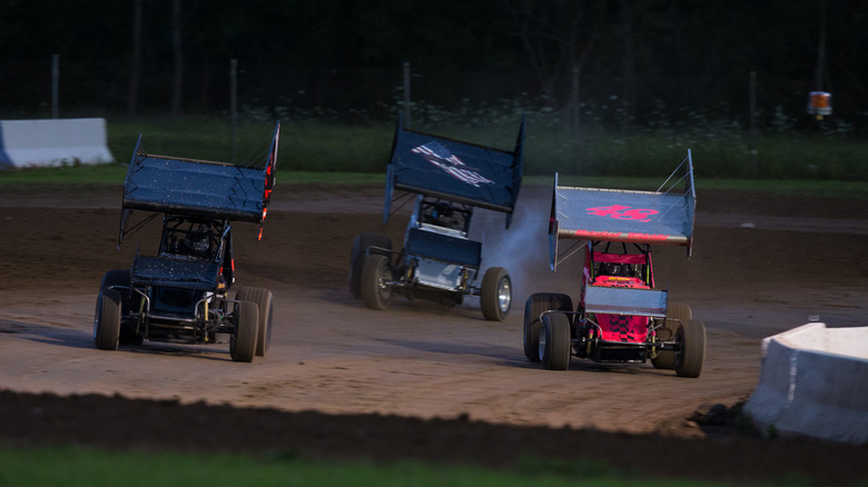 Sprint cars on a dirt track