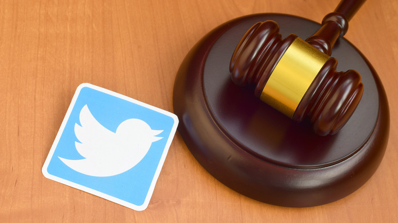 Twitter bird near gavel
