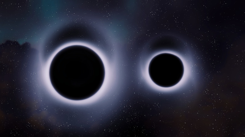 An artist's interpretation of two black holes together in space