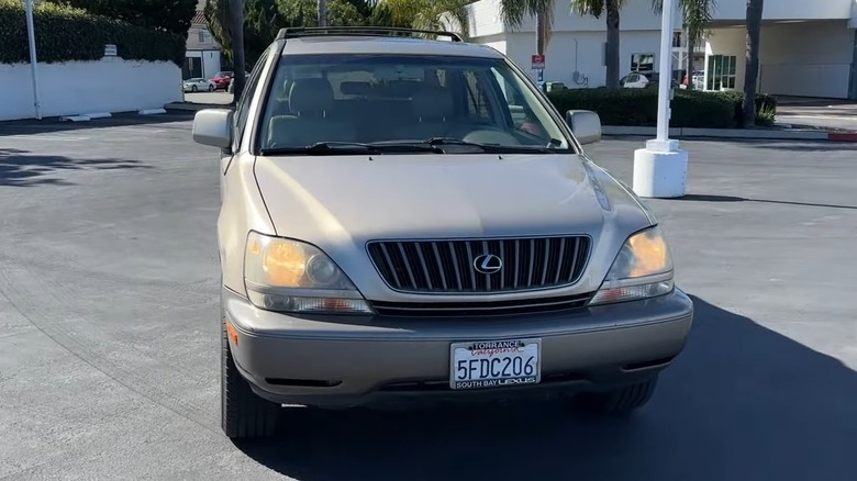 A silver 2000 Lexus RX 300 parked outside