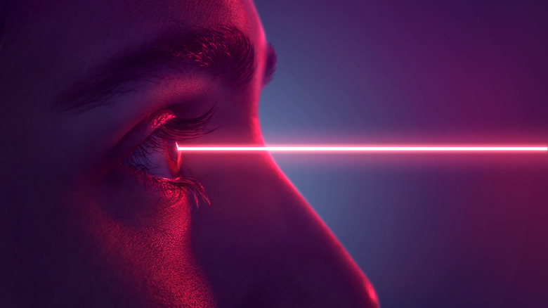 A laser pointing toward an eye