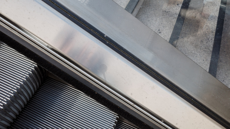 close up of brushes on escalator