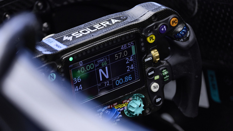 Close-up of Mercedes-AMG steering wheel in cockpit