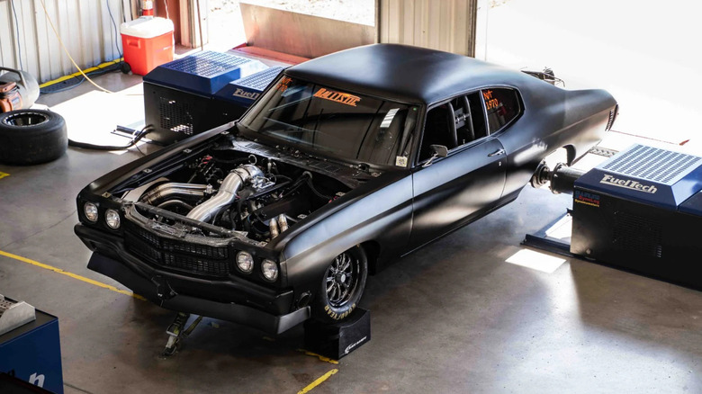 Car getting tuned on a dyno