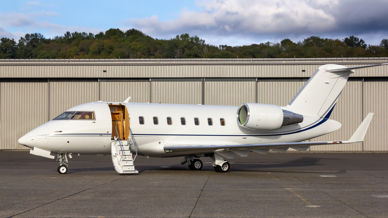 The image shows a Bombardier Challenger 650 corporate business jet
