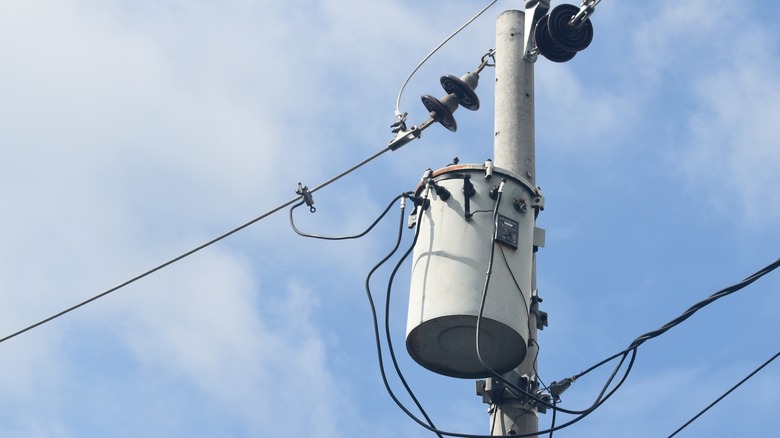 Single pole-mount transformer on pole