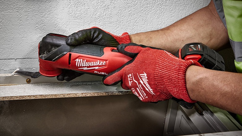 Oscillating tool cutting drywall