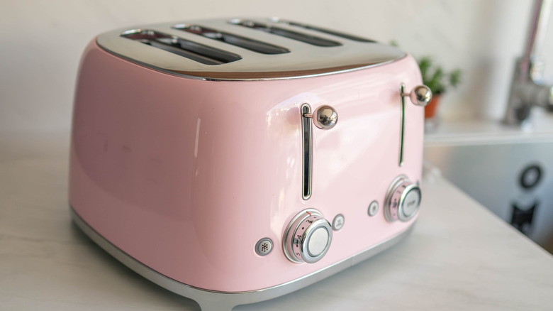 A toaster on a kitchen counter.